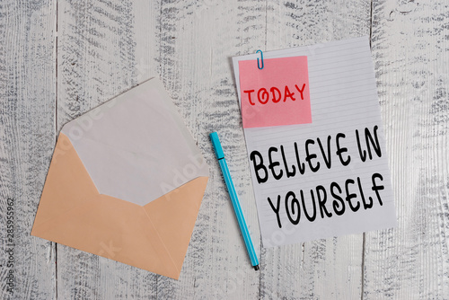 Writing note showing Believe In Yourself. Business concept for common piece of advice that you can do everything Envelope blank sheet sticky note ballpoint wooden background