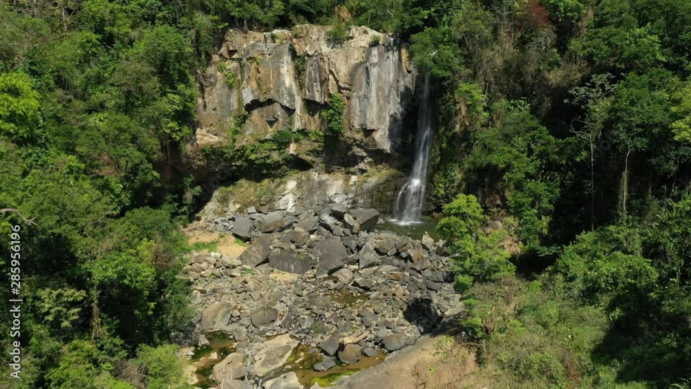 Aerial Drone View of cascade surrounded by the lush rainforest