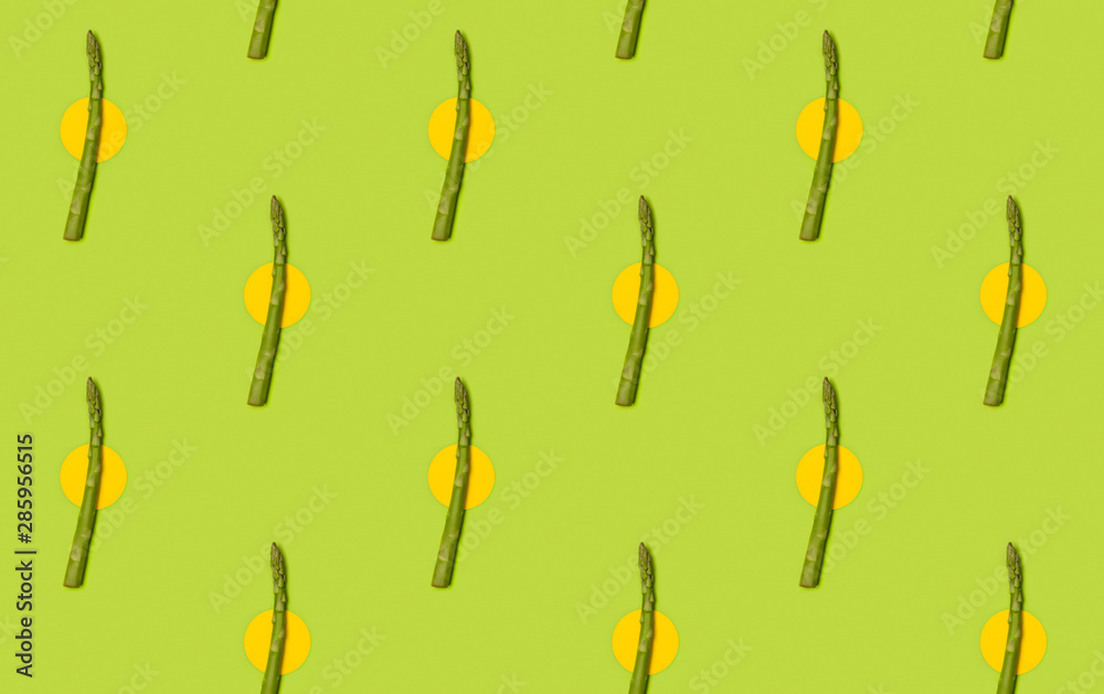 Seamless pattern with fresh asparagus on green table background. Seamless pattern with fresh asparagus on green table background.