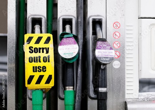 Fuel diesel shortage at petrol station pump with sorry out of order sign
