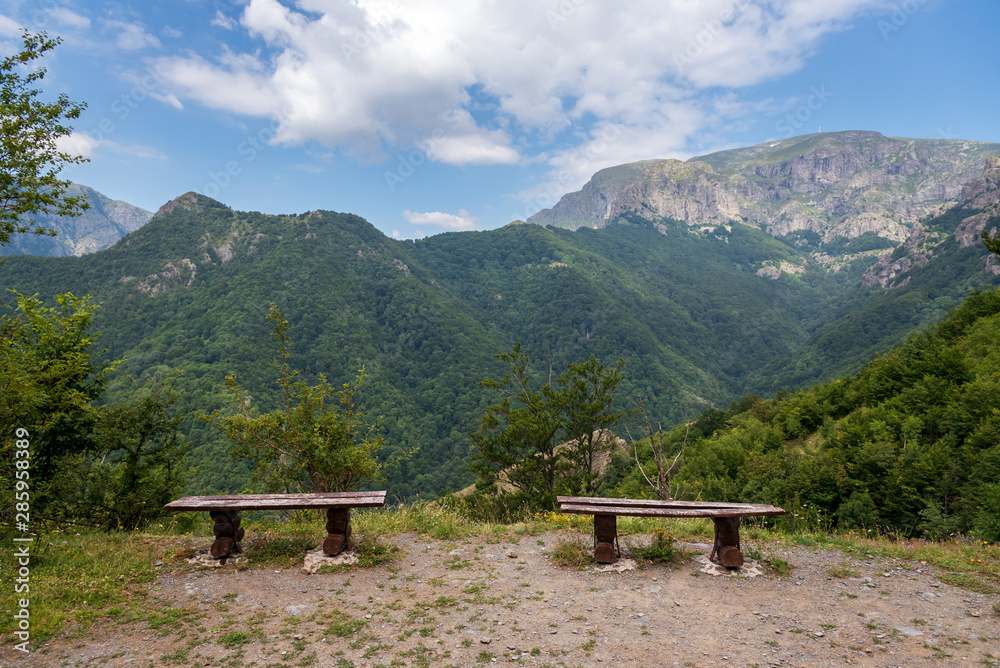 A bench in the meadow at mountains in Bulgaria.