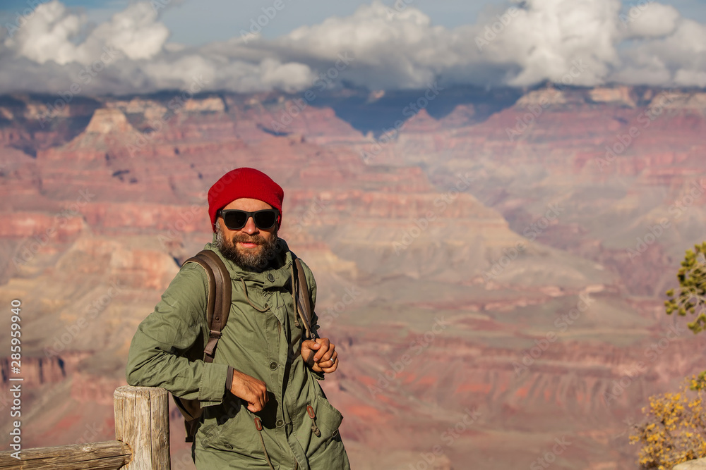 A hiker in the Grand Canyon National Park, South Rim, Arizona, USA. A hiker in the Grand Canyon National Park, South Rim, Arizona, USA.