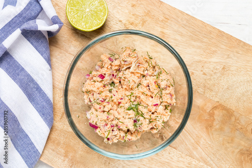 Making tuna salad with greens, top view