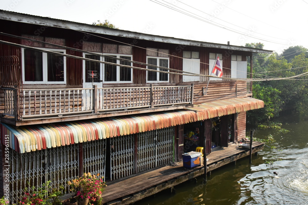 Old house near the canal is habitation tradition culture for comfortable communication by boat.