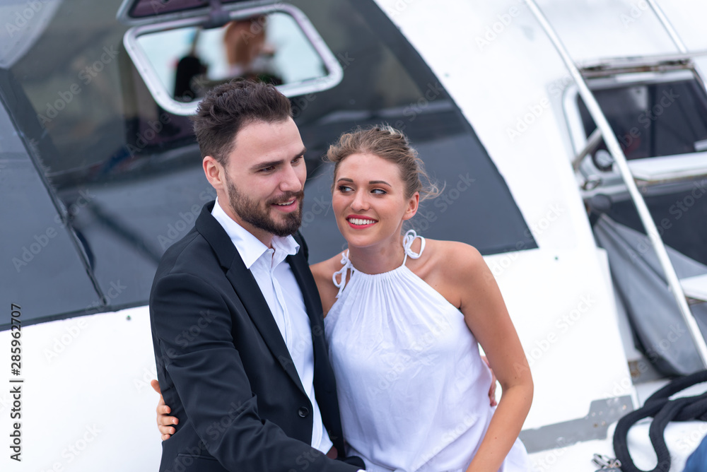 Business couples are celebrating in a yacht, Honeymoon summer trip Business couples are celebrating in a yacht, Honeymoon summer trip