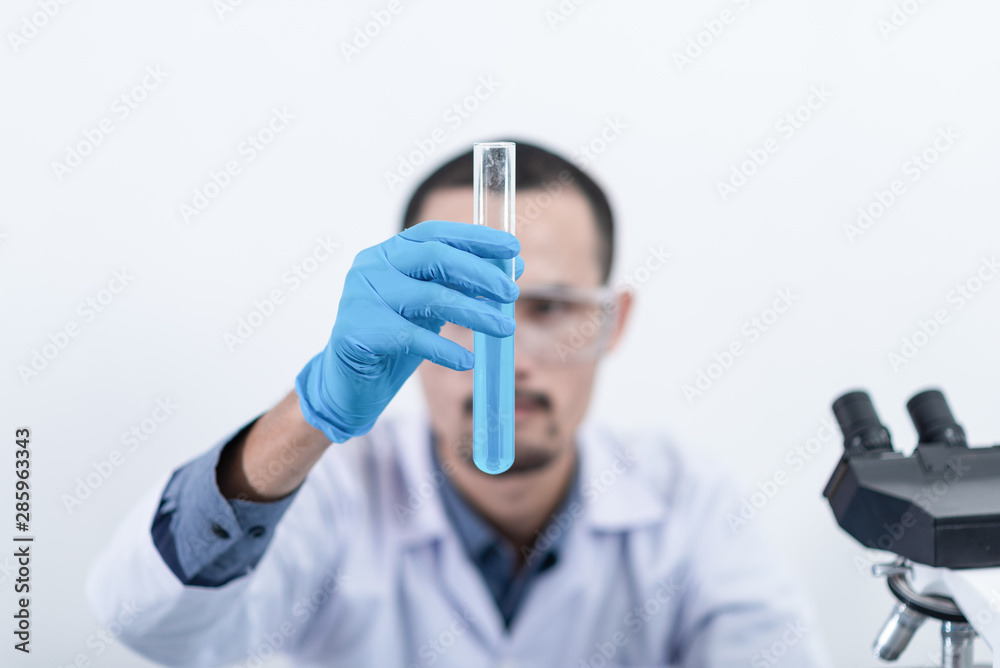 Naklejka premium Researcher in the laboratory Studying with chemicals And microscopes