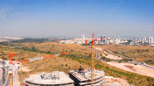 Construction Site and Modiin City Aerial view Flight shot from the city of Modiin In Israel with Construction site  photo