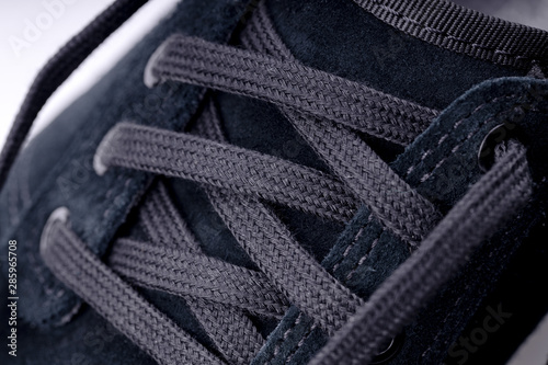 shoelace at modern sneaker shoe. close up.