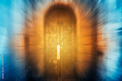 Fototapeta Naklejka Na Ścianę i Meble -  Antique wooden door in an old castle, paranormal phenomenon, portal.