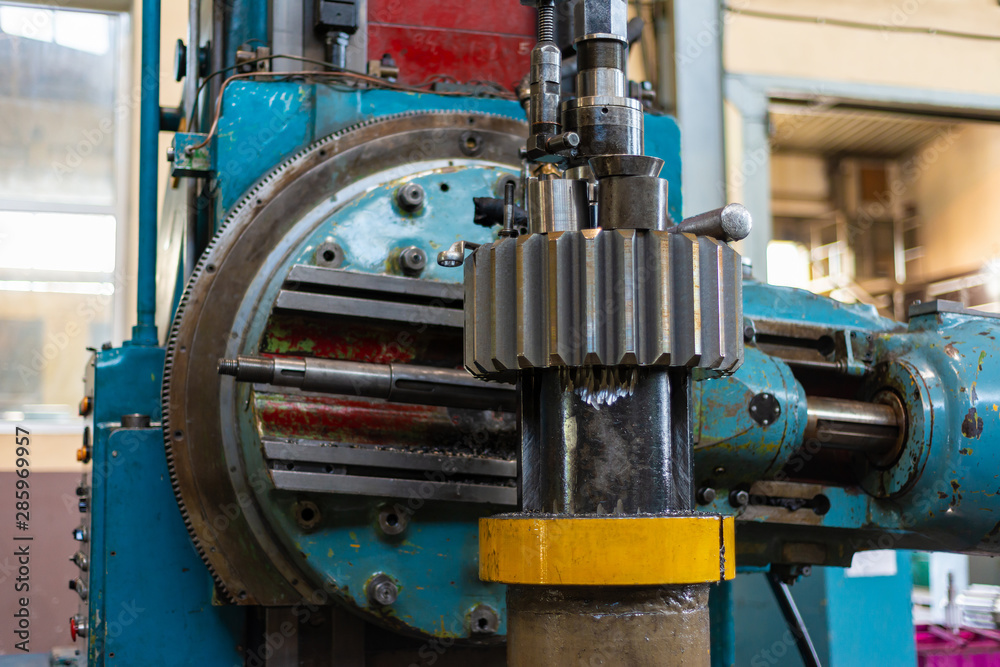 Gear cutting machine at a machine-building enterprise, metal cutting. Gear cutting machine at a machine-building enterprise, metal cutting.