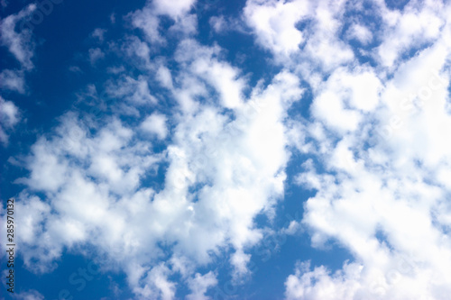 white clouds against blue sky. Blue sky against white clouds © Нажмудин Пирсаидов