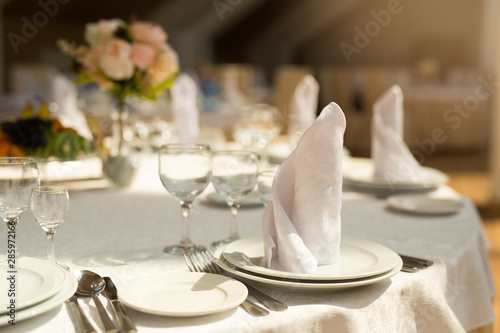 tableware standing on a white festive table