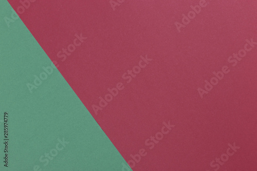 Paper green, burgundy empty background, geometrically located. Color blank for presentations, copy space.