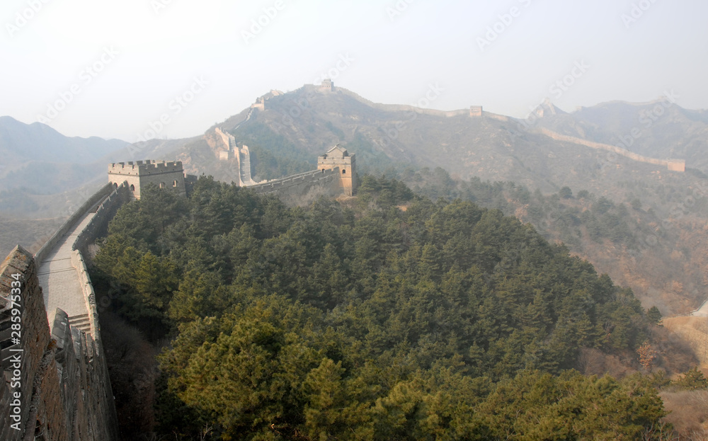 Obraz premium The Great Wall of China. This section of the Great Wall is Jinshanling, a wild part with scenic views. The Great Wall of China near Beijing. Wild Great Wall of China, Jinshanling, Beijing, UNESCO site