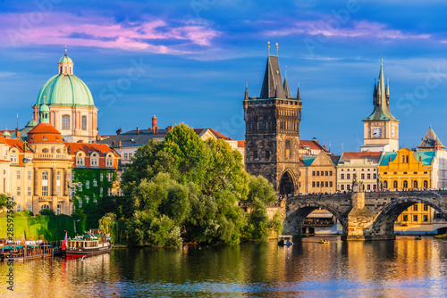 View of dowtown Prague with Charles Bridge over Vltava photo