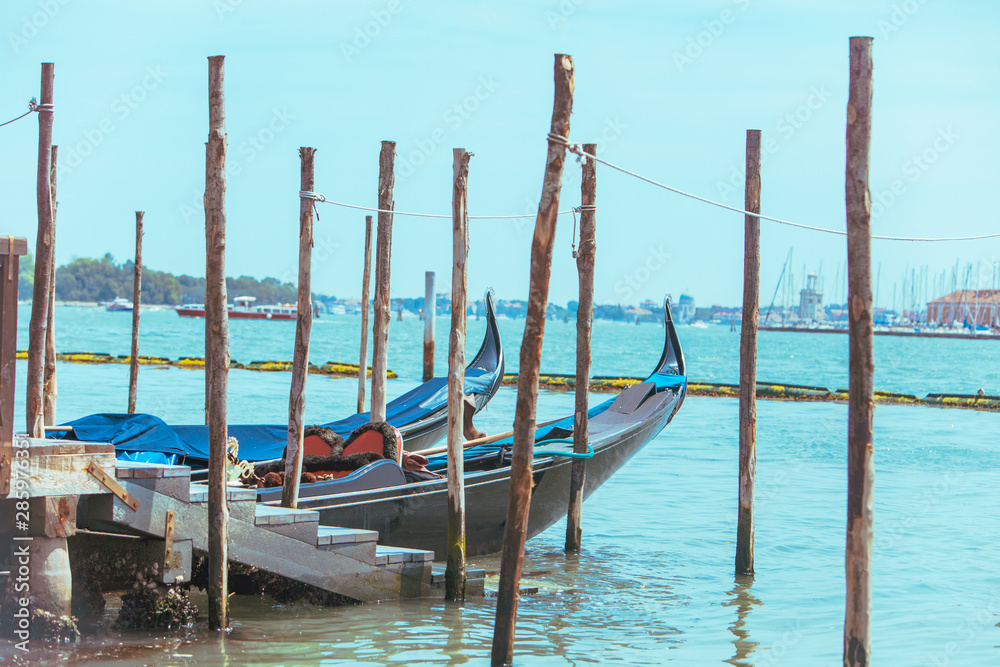 gondolas boats in bay of venice city