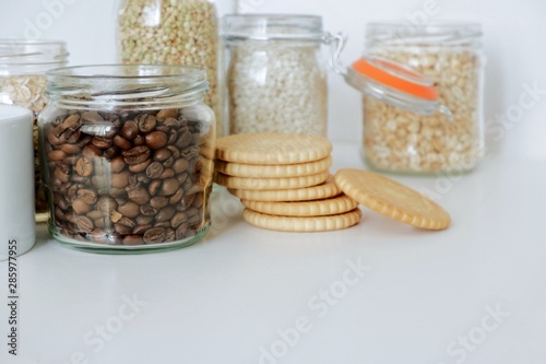 Various cereals, coffee, nuts, bran in glass jars. Zero waste concept, free plastic.