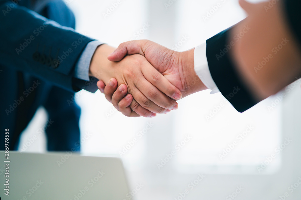 business successful contract agreement two businessman handshake with confident and powerful mission achievement white background