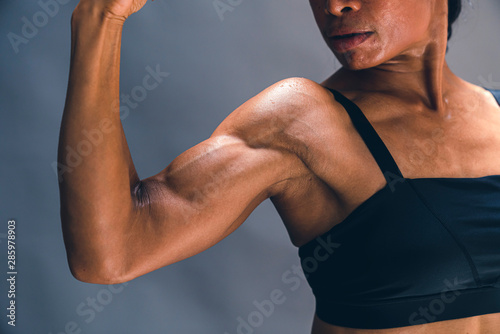 asian strong fit and firm lean muscle studio shoot grey background heathy ideas concept