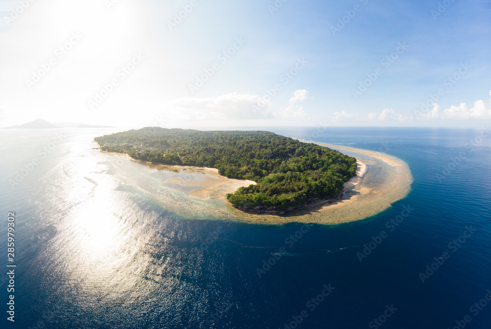 Aerial view tropical beach island reef caribbean sea. Indonesia Moluccas archipelago, Banda Islands, Pulau Ay. Top travel tourist destination, best diving snorkeling.