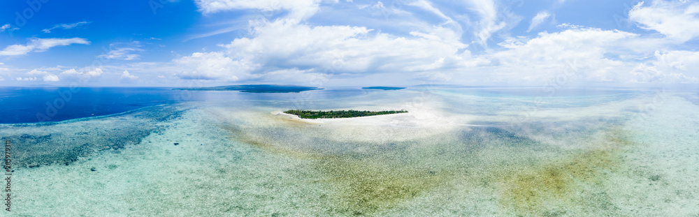 Obraz premium Aerial view tropical beach island reef caribbean sea. Indonesia Wakatobi archipelago, Tomia Island, marine national park. Top travel tourist destination, best diving snorkeling.