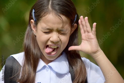 Crazy Girl Student Wearing School Uniform With Notebooks photo