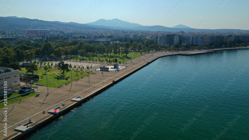 Aerial drone viewof iconic and famous promenade area in new waterfront of Thessaloniki or Salonica featuring iconic Alexander the Great statue, North Greece