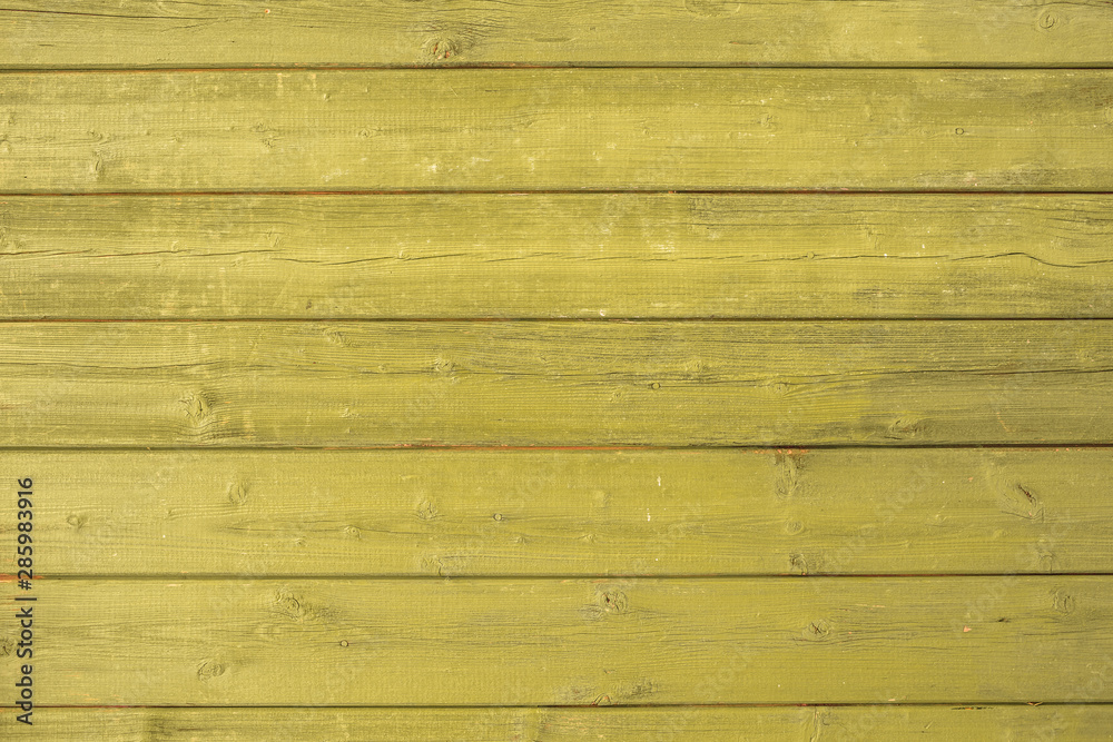 Yellow wooden background texture. Horizontal planks, bars Yellow wooden background texture. Horizontal planks, bars