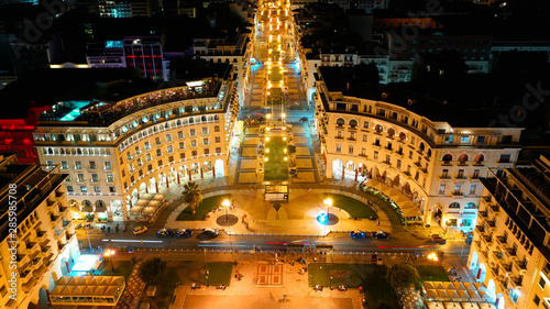 Aerial drone night shot of iconic illuminated Aristotelous square in the heart of Thessalloniki or Salonica, North Greece