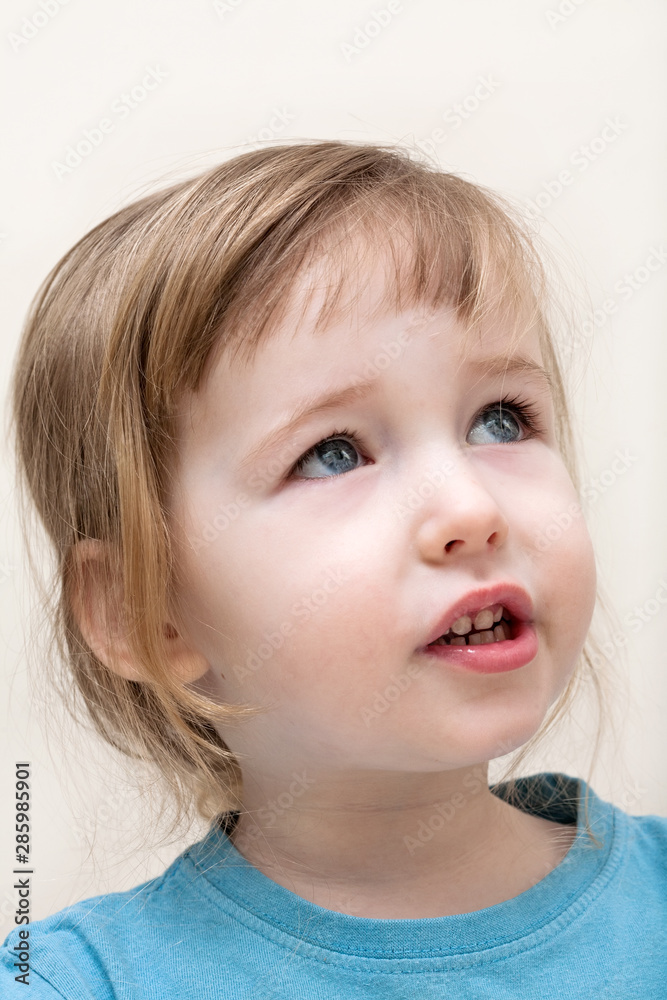 cute girl closeup portrait with interest emotion cute girl closeup portrait with interest emotion