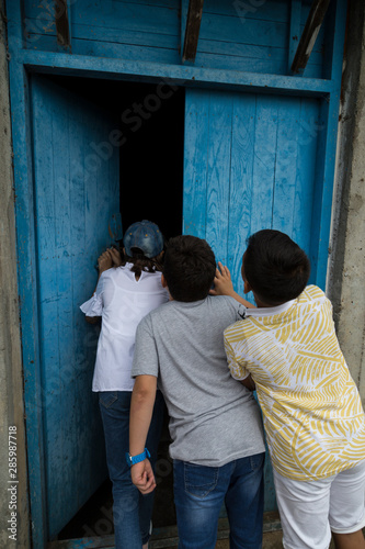 children playing hide and seek at outside. © Fertas