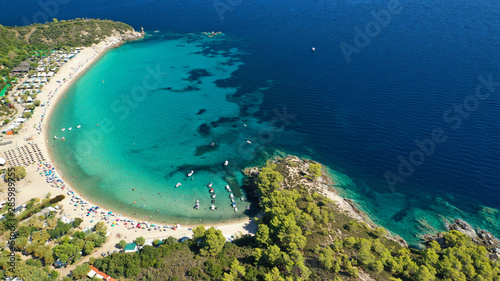 Aerial drone photo of famous turquoise sandy beach of Armenistis in South Sithonia peninsula, Halkidiki, North Greece