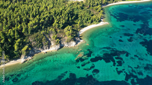 Aerial drone photo of secluded turquoise sandy beaches of South Sithonia peninsula, Halkidiki, North Greece