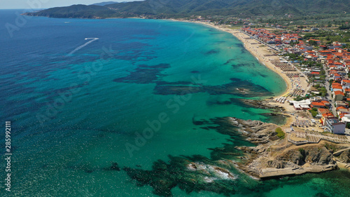 Aerial drone photo of famous village and long sandy beach of Sarti in South Sithonia  Halkidiki  Greece