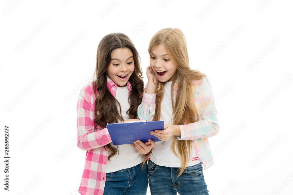 We passed exam. Girls with school textbook white background. School concept. Interesting information. Happy exam results. Here are exam results. Girls cute pupils got results test. Good school marks We passed exam. Girls with school textbook white background. School concept. Interesting information. Happy exam results. Here are exam results. Girls cute pupils got results test. Good school marks