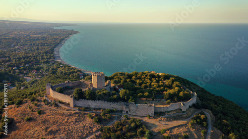 Aerial drone view of iconic and historic medieval castle of Platamonas built in the slopes of Mount Olympus in Pieria area, North Greece photo