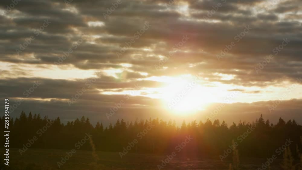 time lapse. Sun setting over the forest. time lapse. Sun setting over the forest.