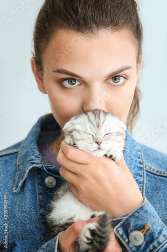 Beautiful young woman with ...