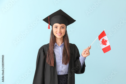 Female graduate with Canadi...