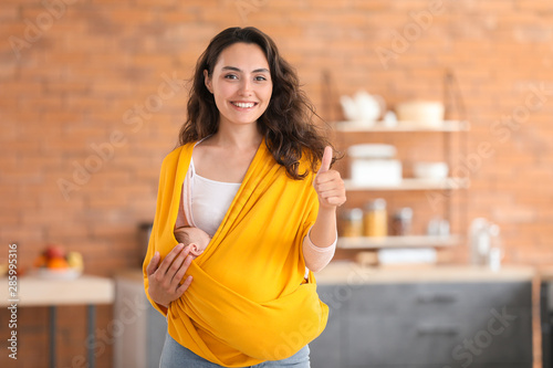 Young mother with little ba...