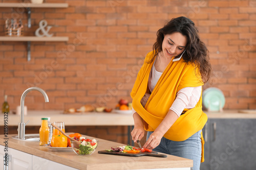 Young mother with little ba...