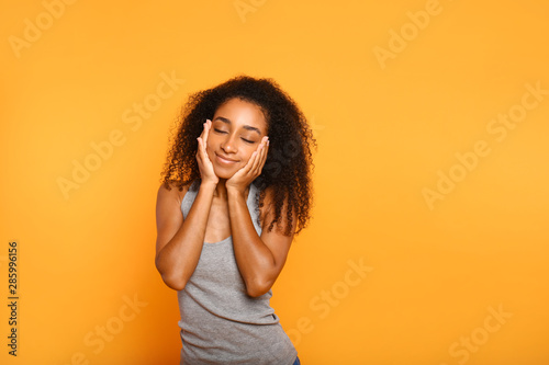 Portrait of sleepy African-...