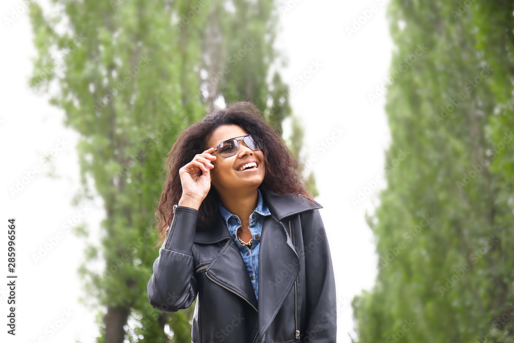 Beautiful young African-American woman outdoors Beautiful young African-American woman outdoors