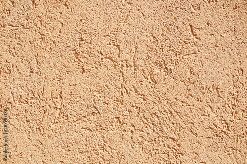 Sandy-colored modern grainy stucco texture