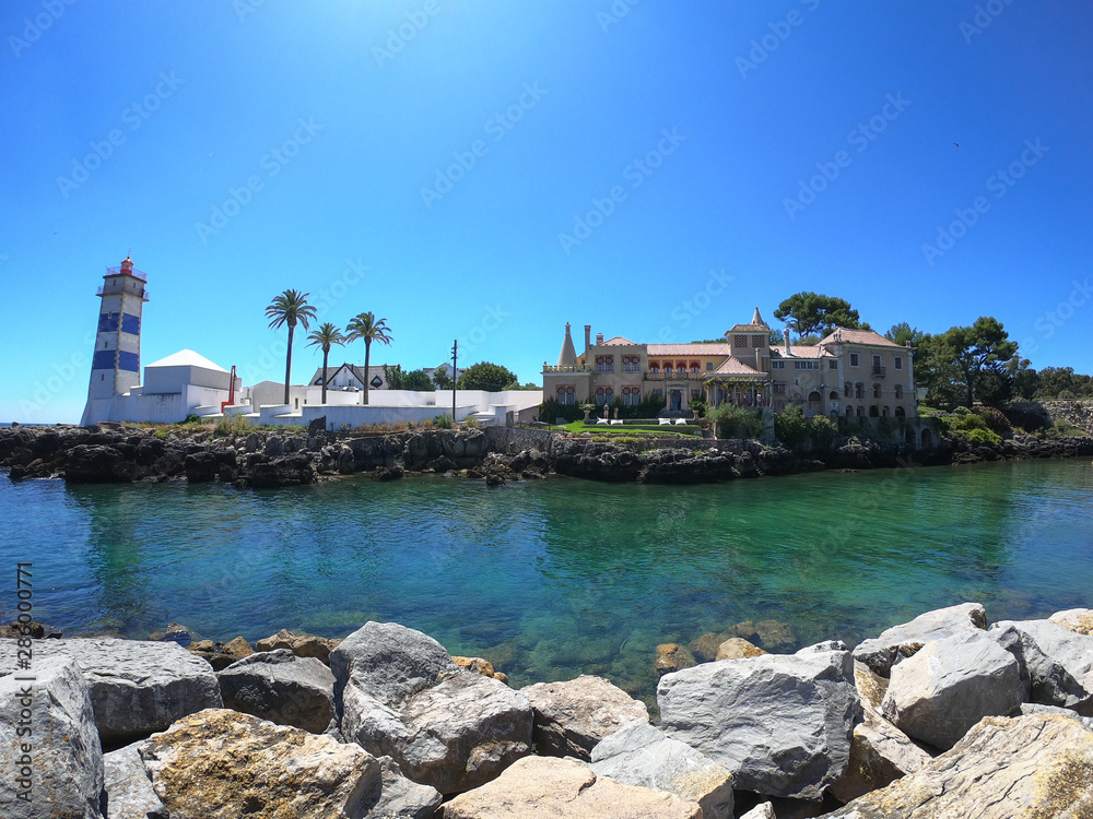 Fototapeta premium Scenic view in Cascais, Santa Marta Lighthouse and Museum, Lisbon district, Portugal. August 2019