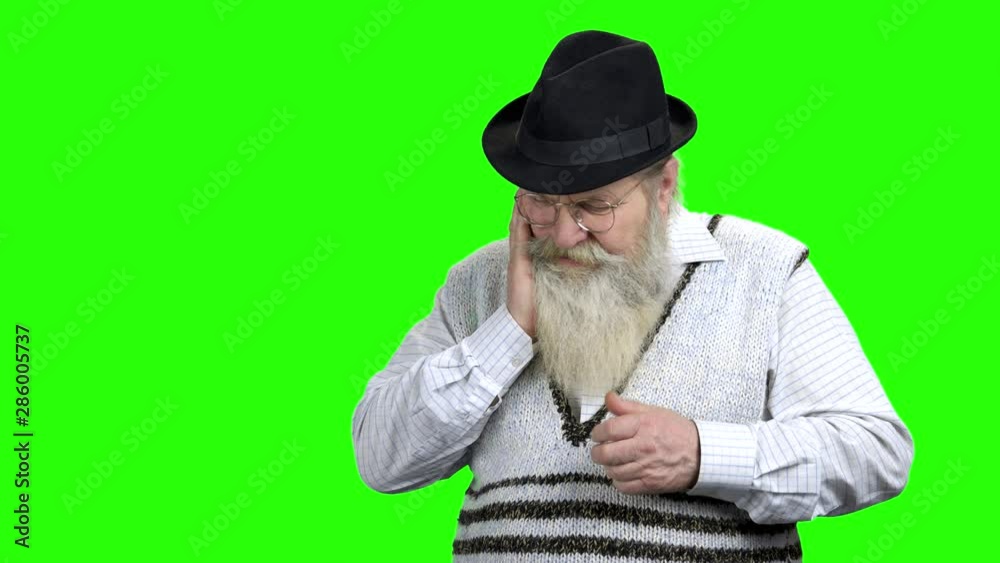 Old man having toothache on green screen. Aged caucasian man suffering from tooth pain. Alpha Channel background. Old man having toothache on green screen. Aged caucasian man suffering from tooth pain. Alpha Channel background.