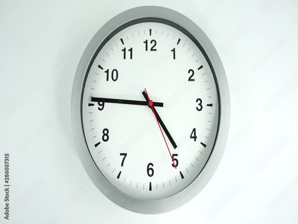 Closeup White wall clock face beginning of time 04.45 am or pm, Clock minute walk slowly, Time concept. Closeup White wall clock face beginning of time 04.45 am or pm, Clock minute walk slowly, Time concept.