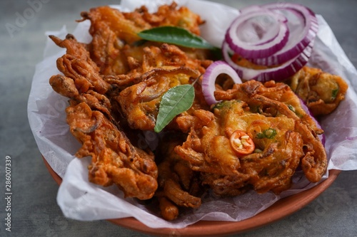 Gluten free Onion Fritters /Kerala Ulli Vada made of chickpea flour, selective focus photo