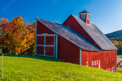 Red barn during a New England fall foliage.