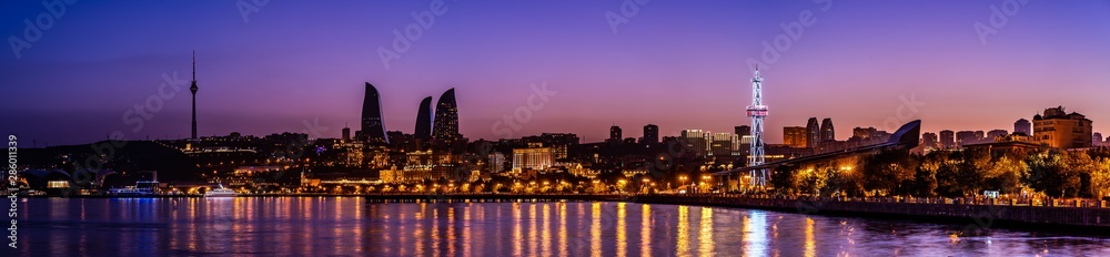 Panoramic view of Baku - the capital of Azerbaijan after sunset reflected on the Caspian Sea